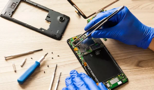 technician-working-on-fixing-cellphone